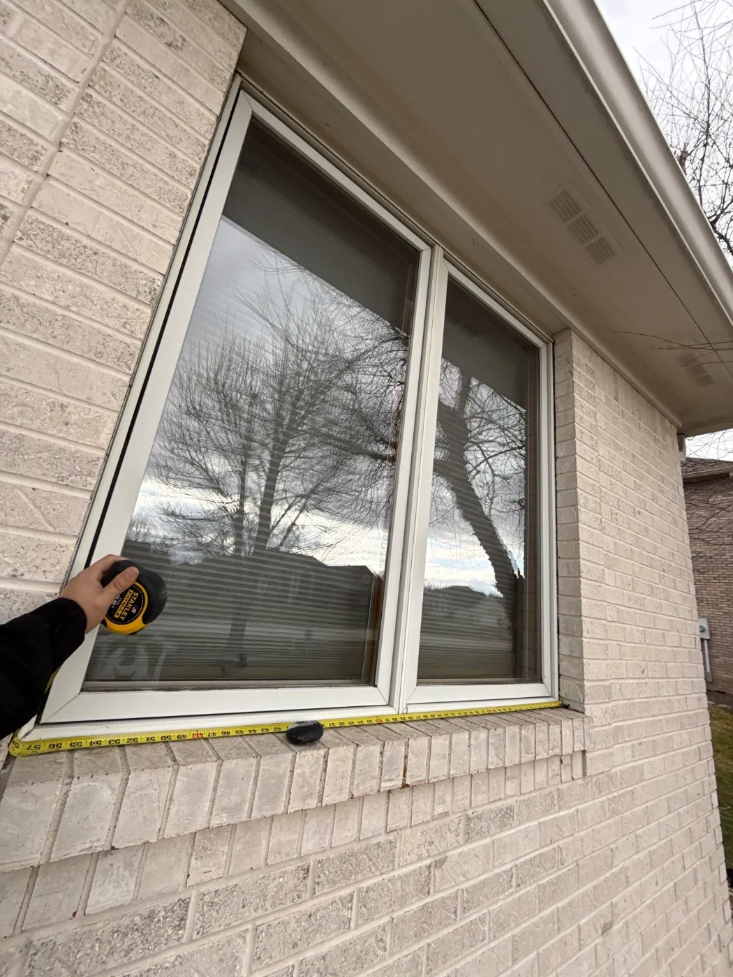 Frame and seal detail on a Brendonwood window job